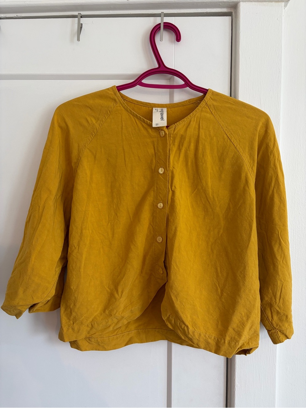 Mustard yellow button-front women's top